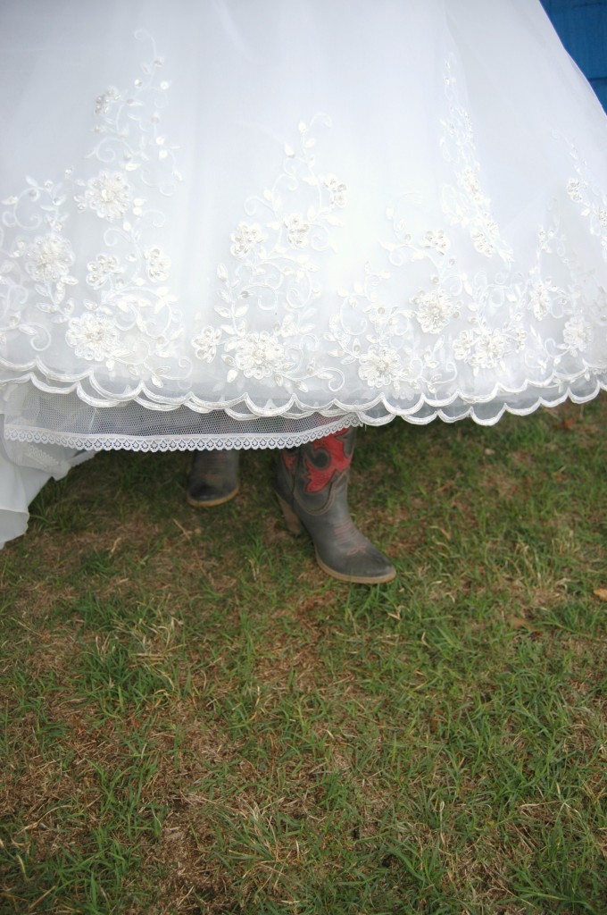 Its not a true Texas wedding if the Bride's not wearing cowboy boots!  - busybeingjennifer.com