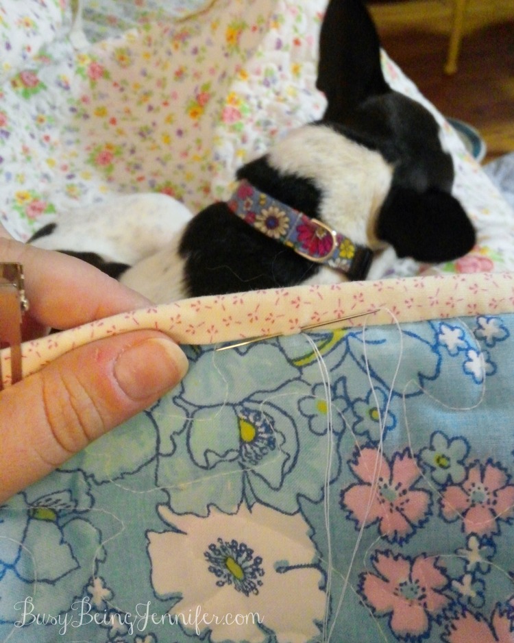 Hand Stitching the binding on my Vintage Sheet Quilt - BusyBeingJennifer.com