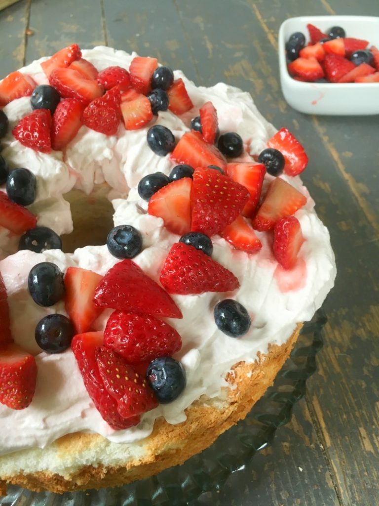 Angel-Food-Cake-with-Yogurt-Cream-and-Fresh-Strawberries-and-Blueberries