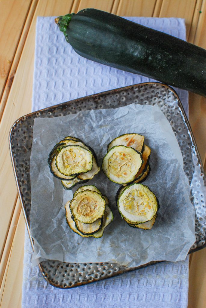 Tasty, Healthy and good for you these Baked Lemon Pepper Zucchini Chips are gluten free and low carb! I've got to try this easy recipe from BusyBeingJennifer.com