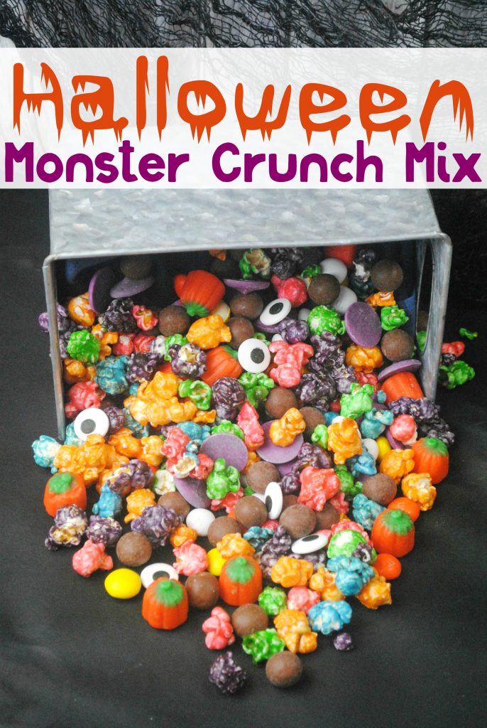 Doesn't this Halloween Monster Crunch Mix look colorful and tasty?!?! Its the perfect snack for all your Halloween parties!