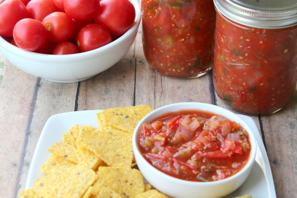 There is nothing like opening up a can of delicious HOMEMADE salsa! This Canned Slow Cooker Restaurant Style Salsa will definitely satisfy the whole family!