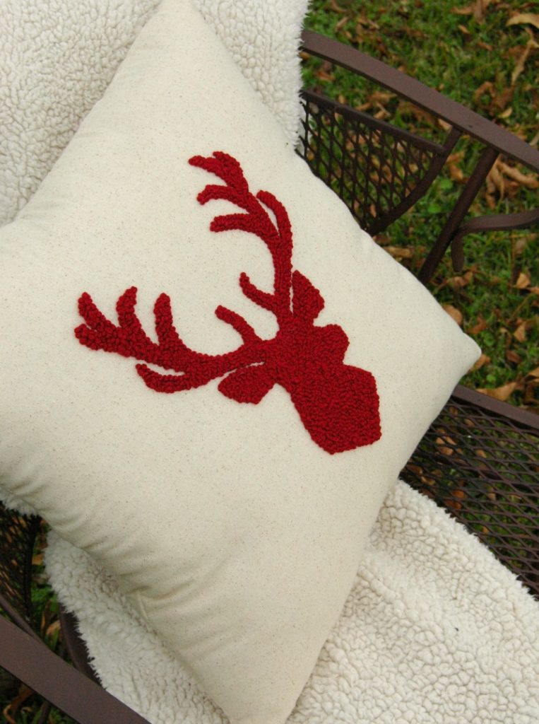 This French Knot Stag Head Pillow turned out AMAZING! If you've mastered the French Knot, then you'll LOVE the uniqueness of this project! This handmade pillow would look amazing in a Farmhouse this Christmas! There are DIY details too!
