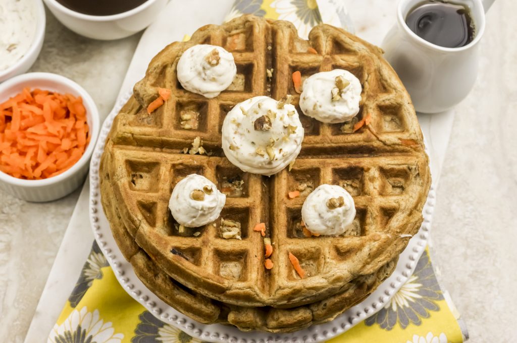 I love waffles. I love carrot cake. Put those 2 favorites together and you've got a tasty breakfast! This is the BEST carrot cake waffles recipe! 